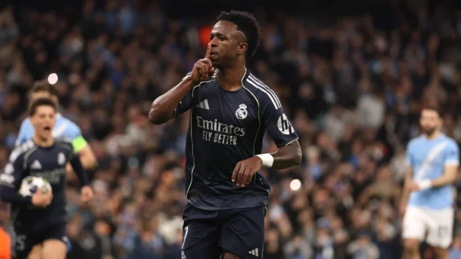 
					Selebrasi Vinicius Jr usai momen penting lawan Manchester City jadi sorotan.